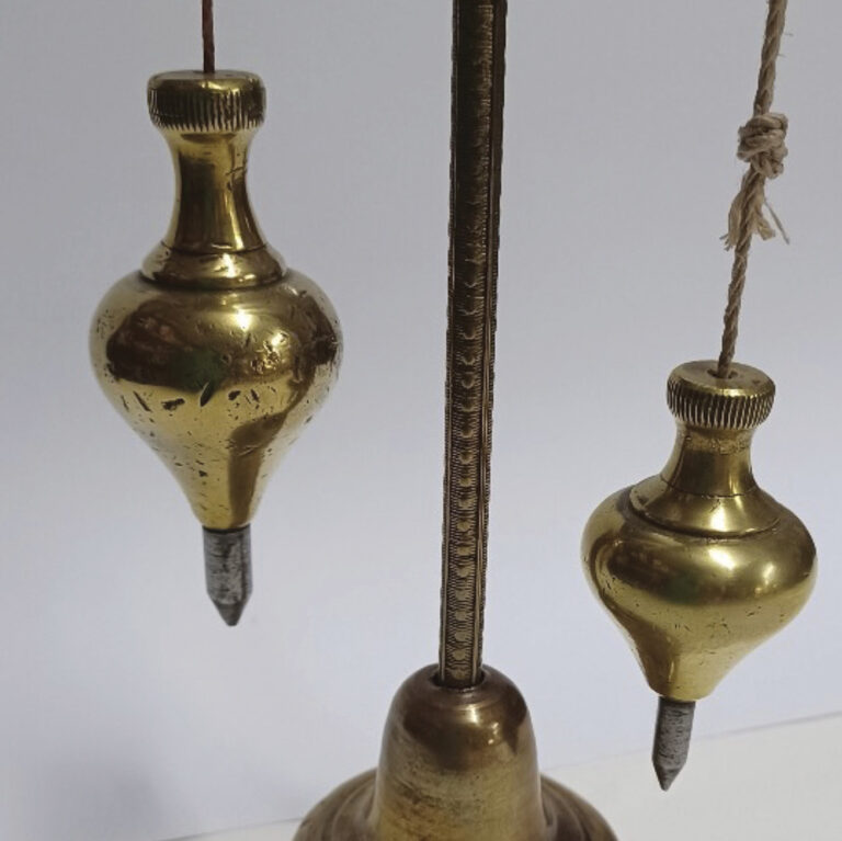 Vintage brass plumb bobs