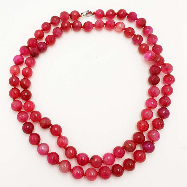 Vintage long necklace of pink chalcedony beads