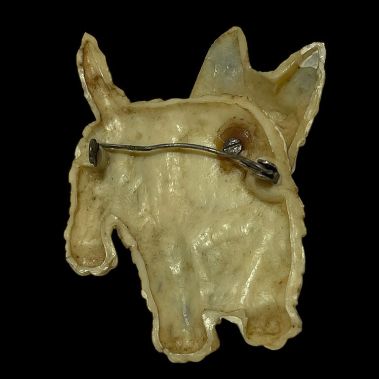 Vintage 1930s celluloid brooch in the form of a jaunty little terrier