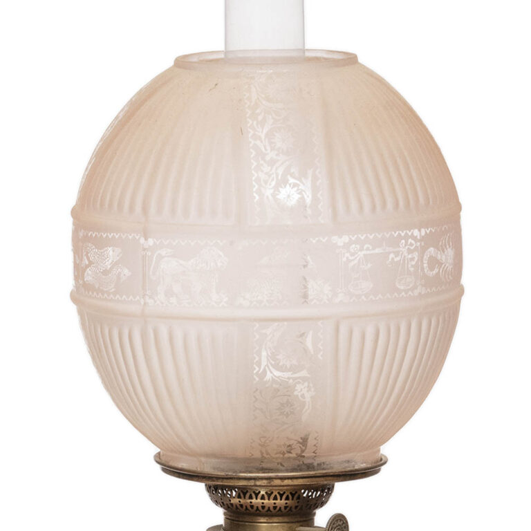 English lamp with Hinks base depicting a figure.