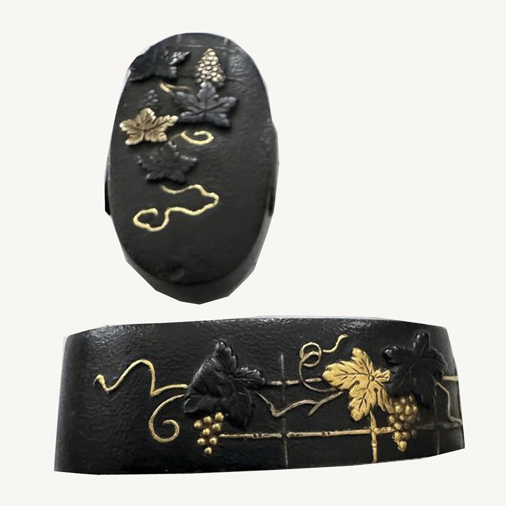 set of antique Japanese fuchi kashira with grape motif.