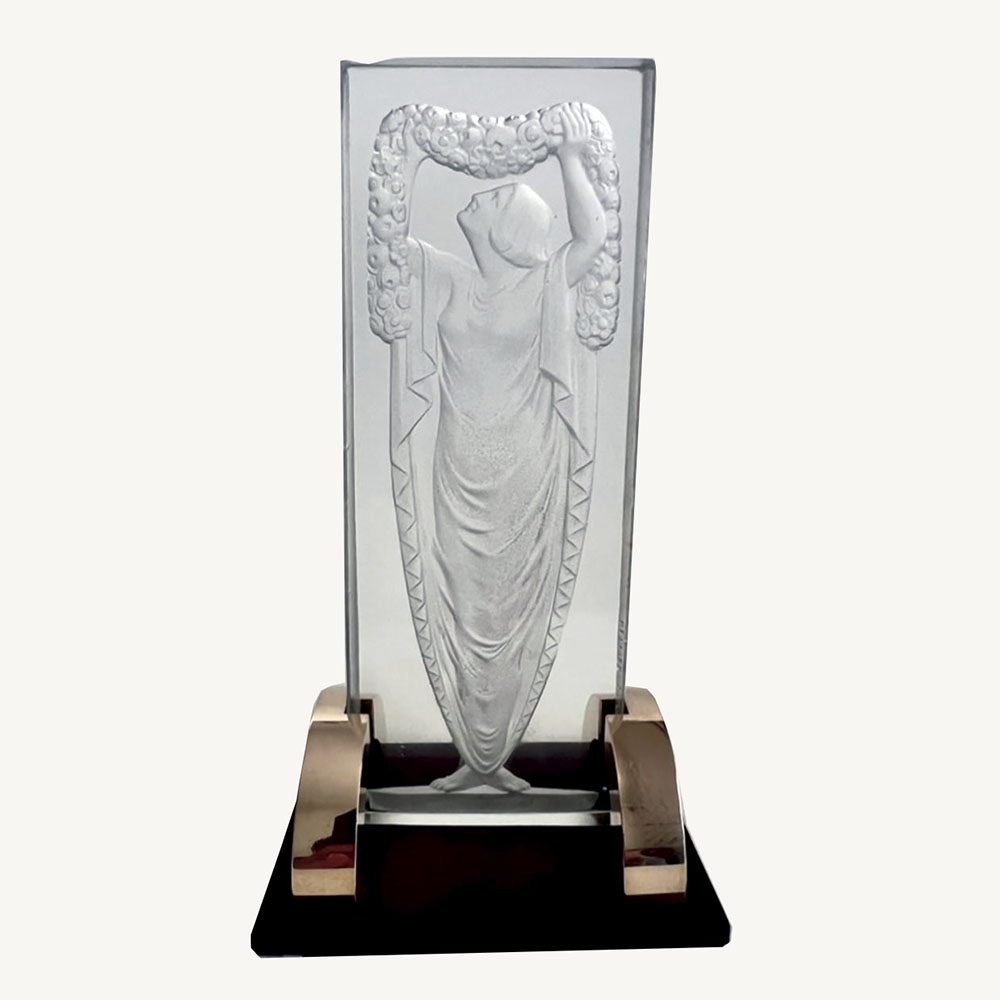 rare Art Déco glass panel intaglio moulded with a draped woman holding up a garland of flowers