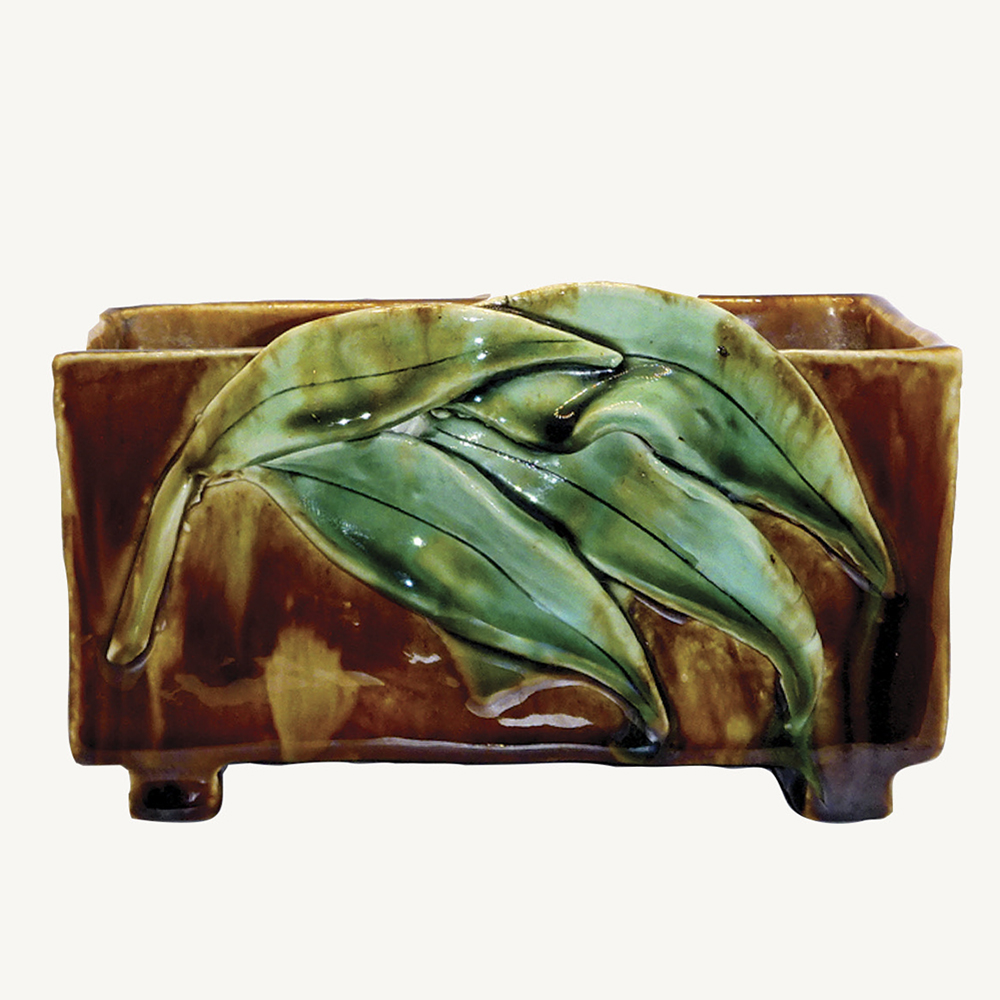 1930s Harvey School pottery trough with gumleaf motifs