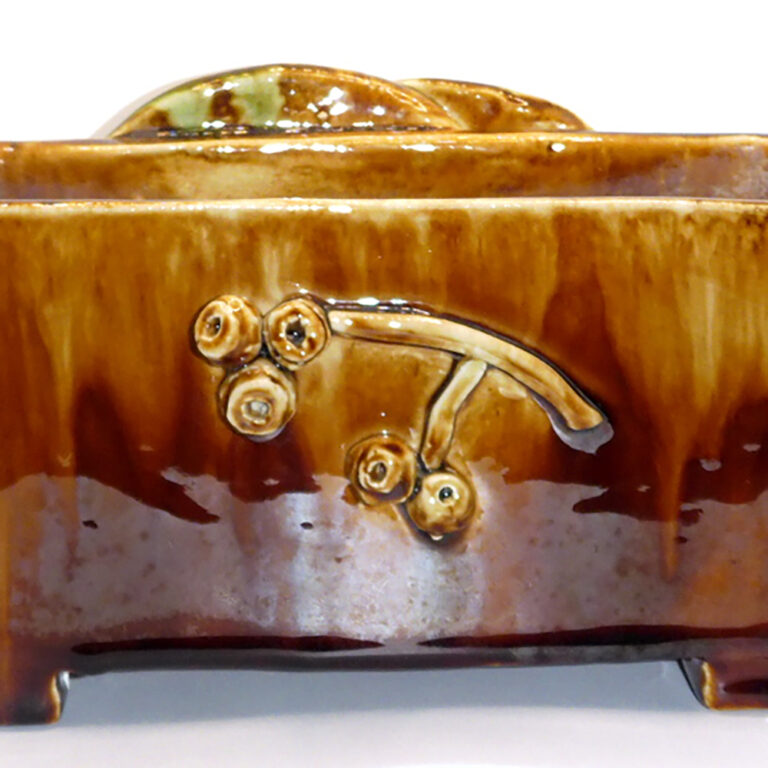 1930s Harvey School pottery trough with gumleaf motifs