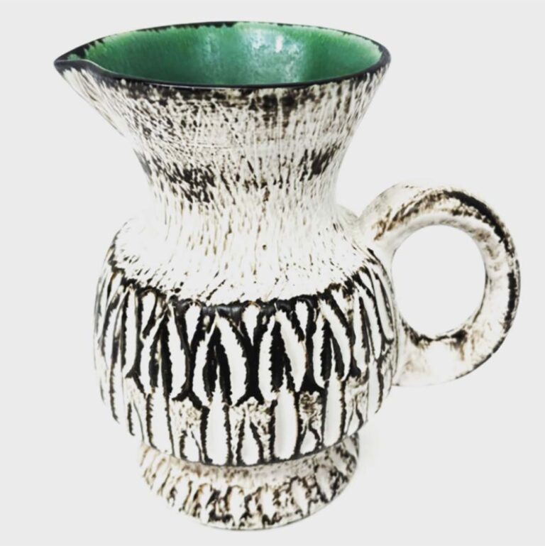A Dagmar & Miloslav Kratochvil, (Czech-Australia) Ellis Pottery (1967-late 1970s) Slip Cast Hand Decorated Footed Jug at Theodore Bruce Auction