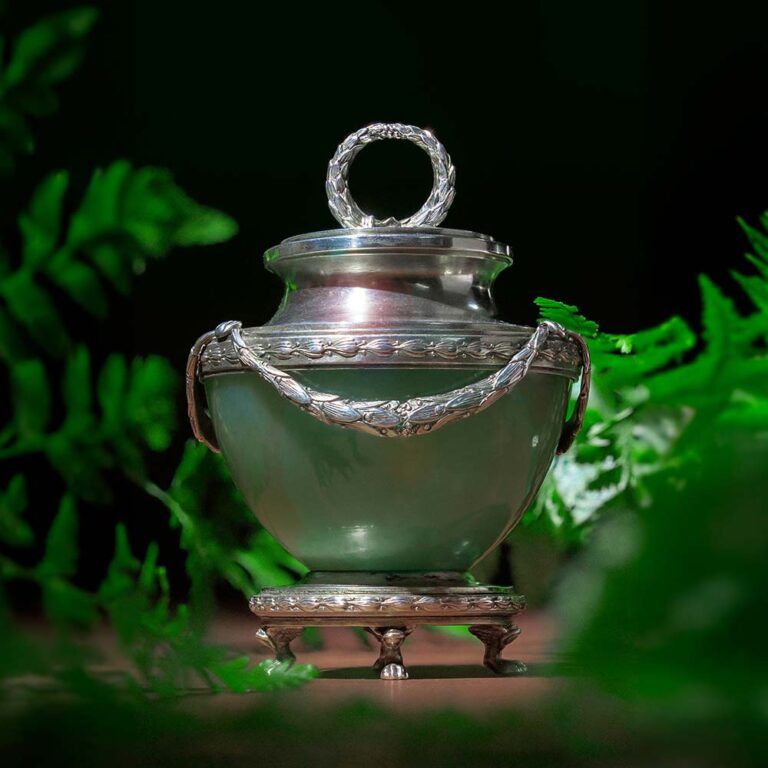 An Imperial Period Faberge inkwell in bowenite and silver, circa 1910.