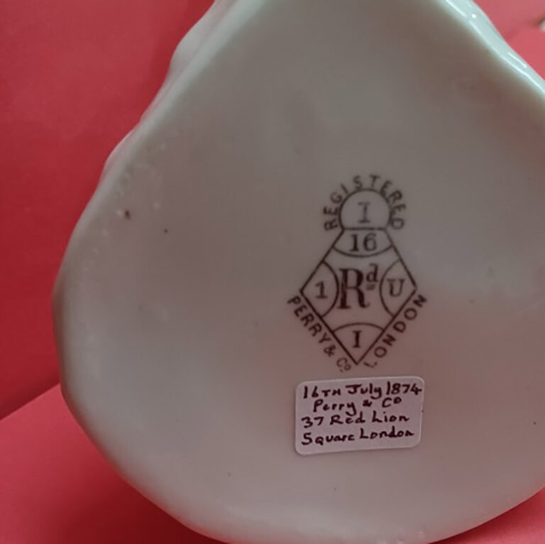 Porcelain stylised dolphin inkwell