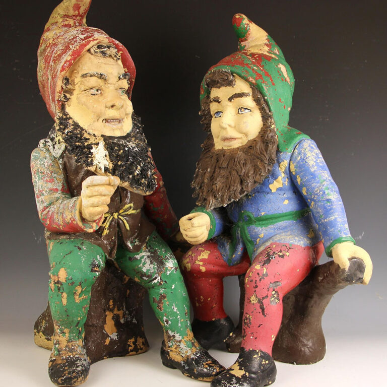 Pair of antique garden gnomes