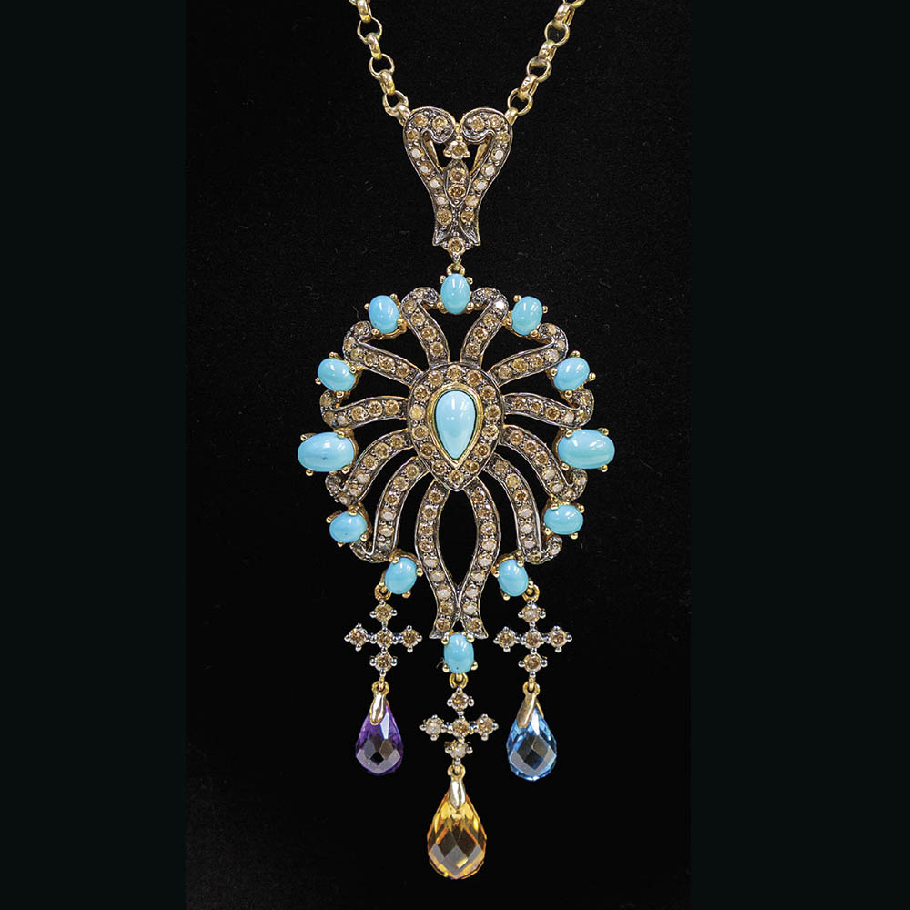 vintage gold and gemset pendant