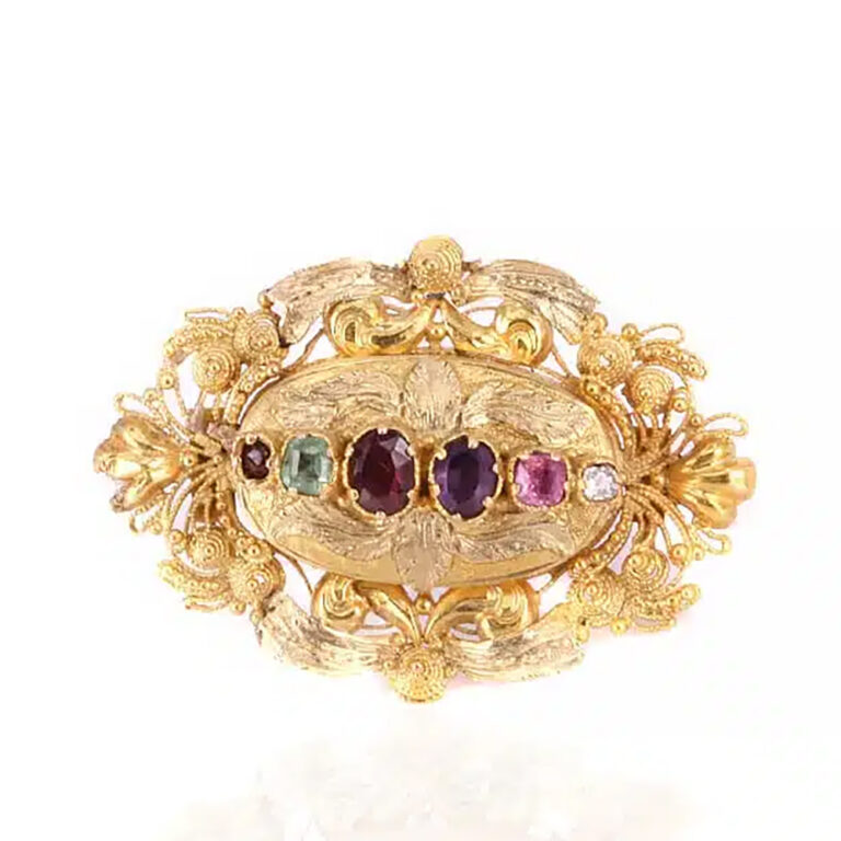 Antique Regard brooch with a locket on the reverse