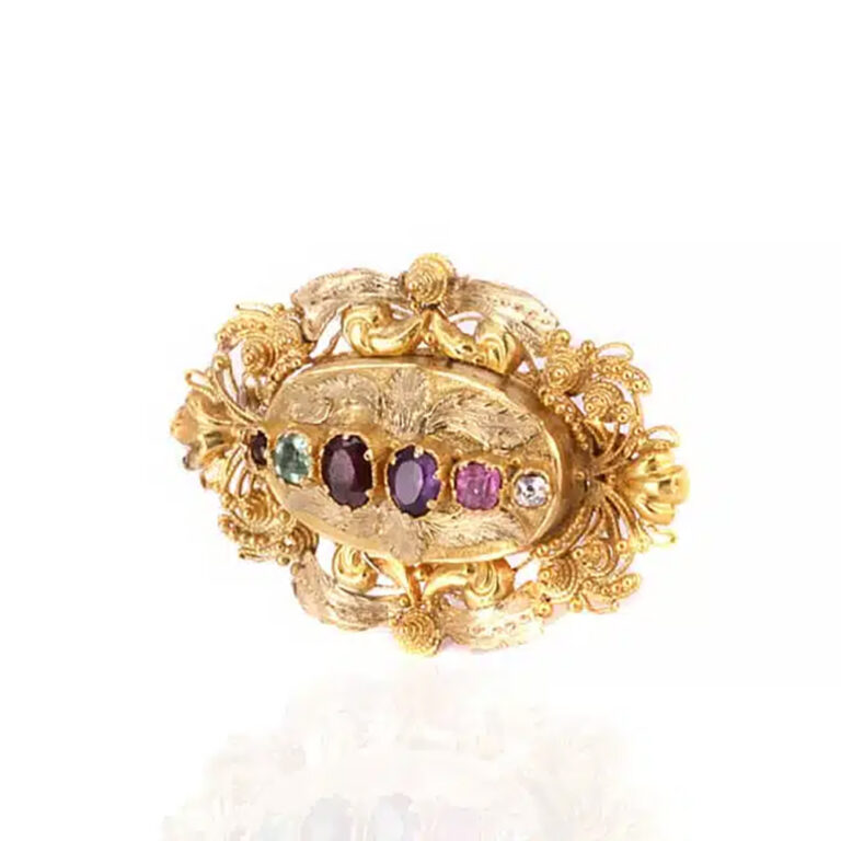 Antique Regard brooch with a locket on the reverse