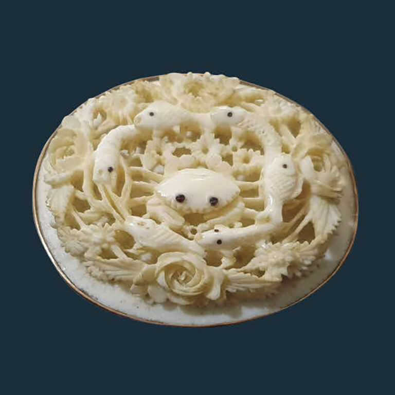 Japanese carved ivory brooch