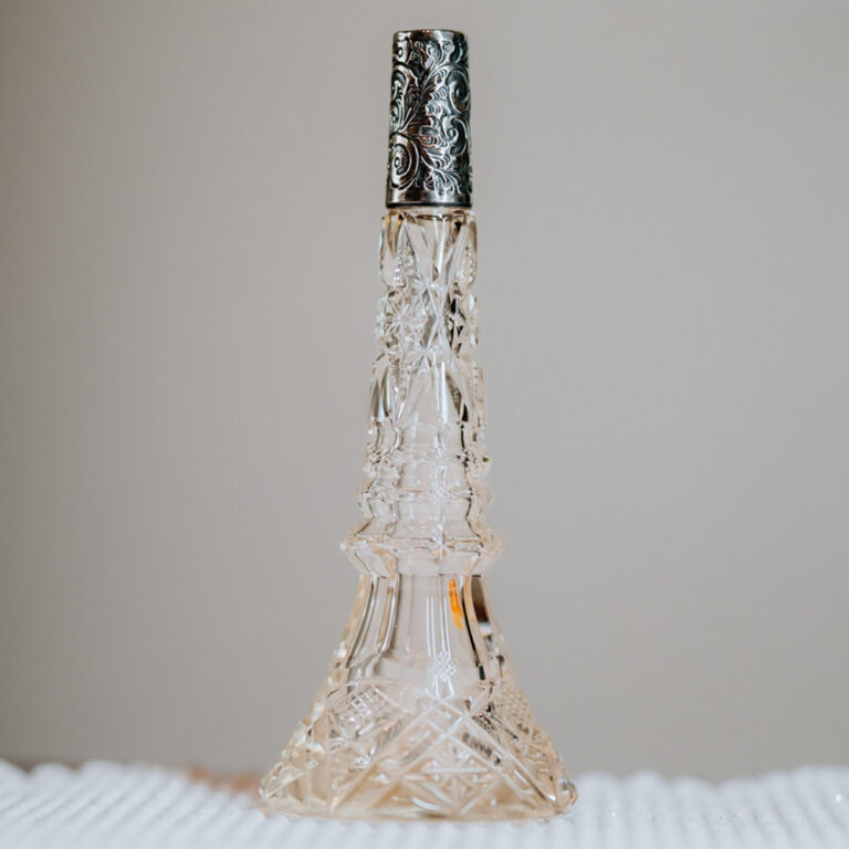 Crystal perfume bottle with silver collar
