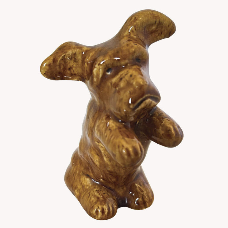 An Australian pottery dog figure by Bennetts Adelaide Pottery