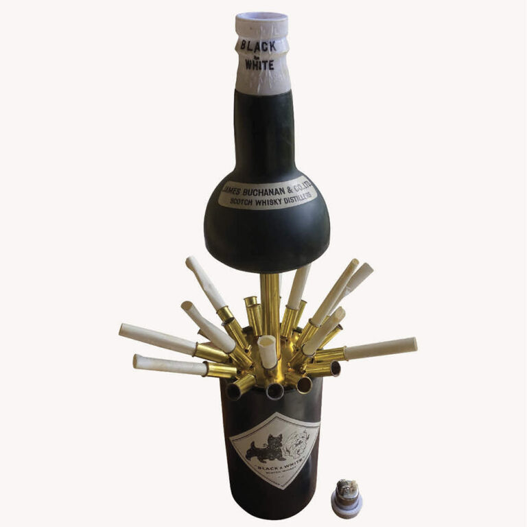 Buchanans Black & White scotch whisky musical bottle dispenser.