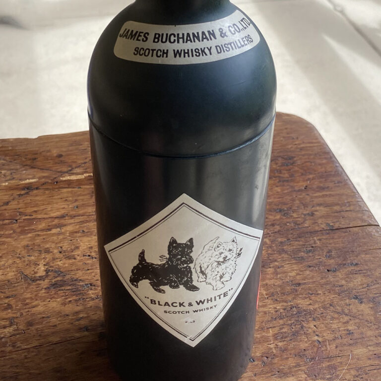 Buchanans Black & White scotch whisky musical bottle dispenser.