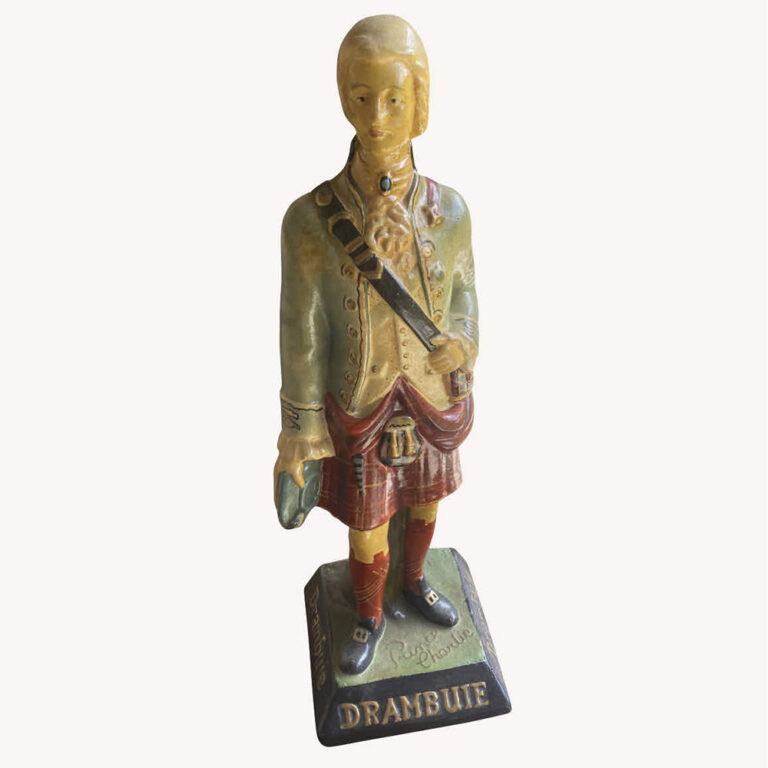 Early celluloid advertising figurine For Drambuie