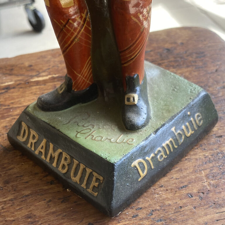 Early celluloid advertising figurine For Drambuie
