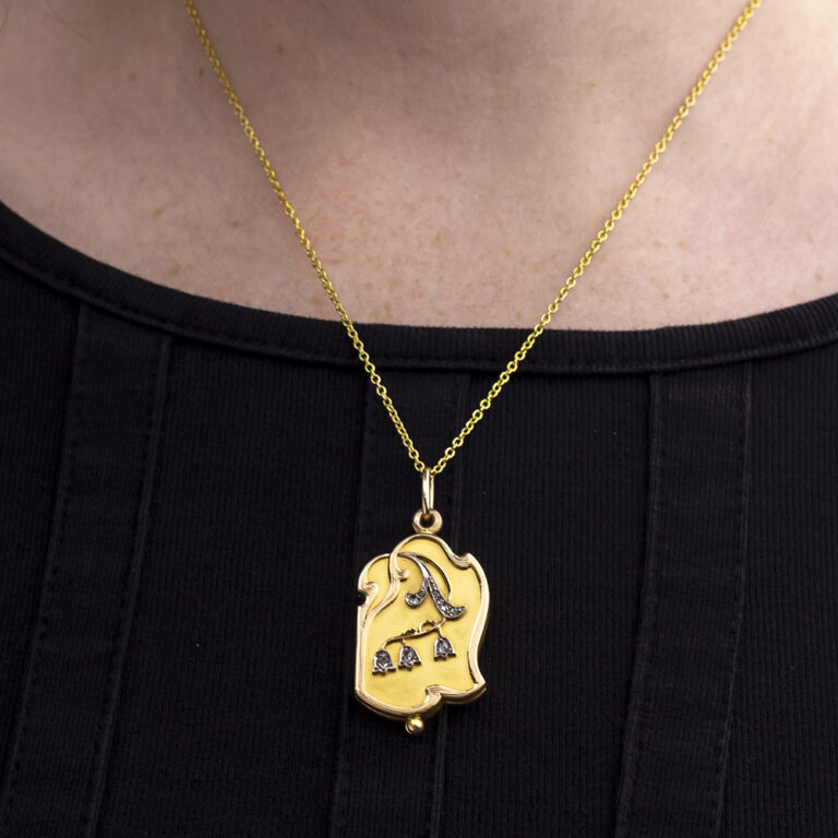 Art Nouveau sliding locket, lily of the valley design