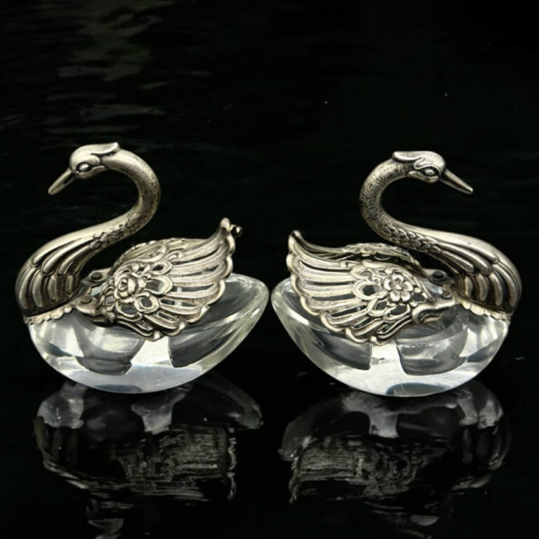 Pair of Continental silver salt cellars, swans