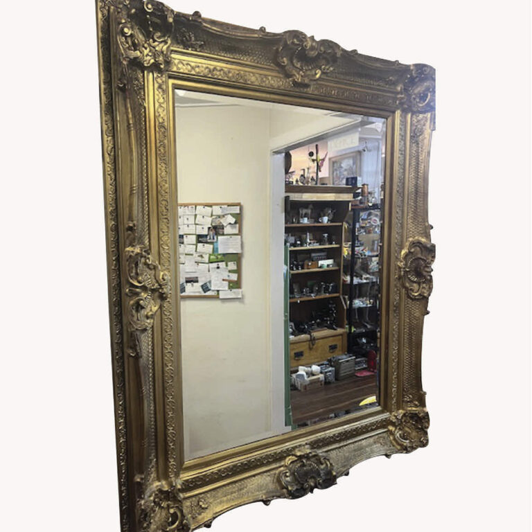 gilt frame mirror of ornate style