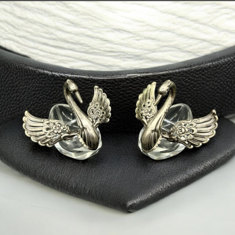 Pair of Continental silver salt cellars, swans