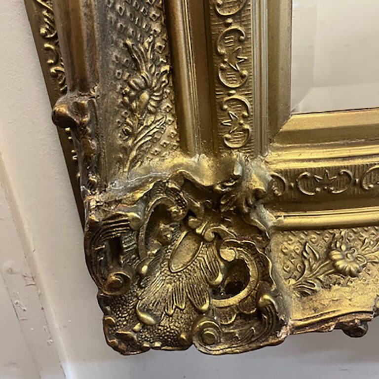 gilt frame mirror of ornate style