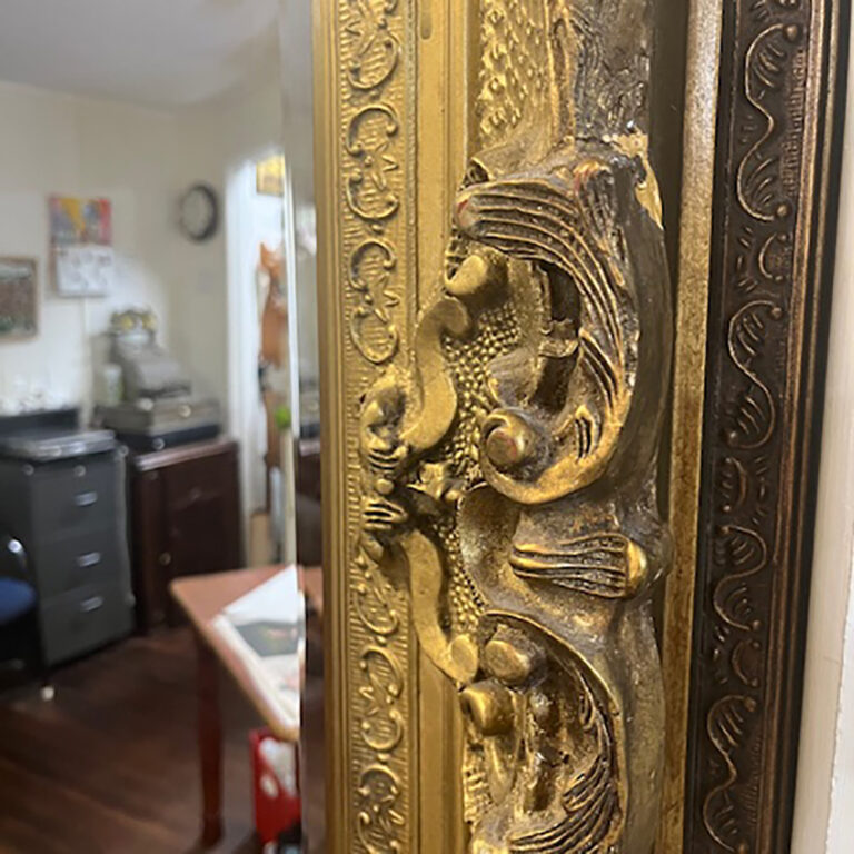 gilt frame mirror of ornate style