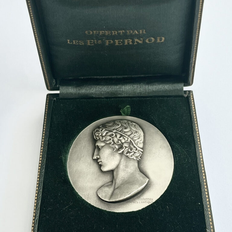 silvered bronze medallion of Apollo