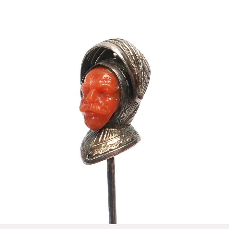 A Victorian Sterling Silver & Finely Carved Coral Knight's Head Stick Pin with Articulated Visor
