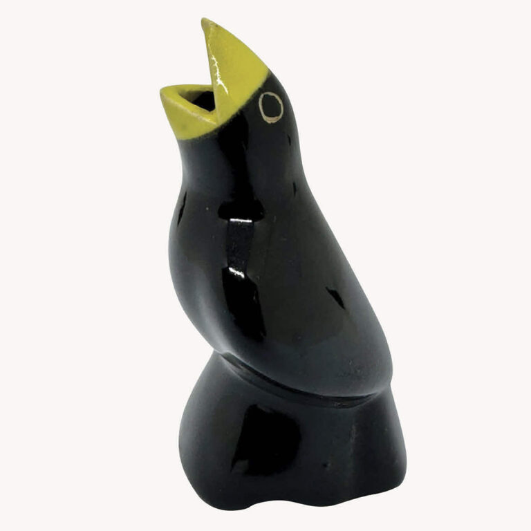 Vintage black and yellow ceramic pie bird