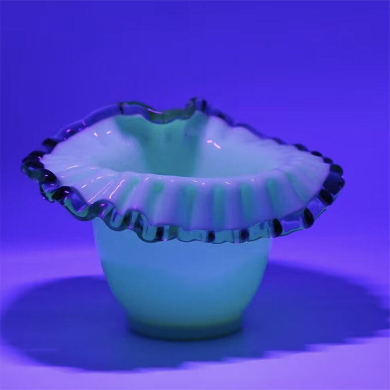 Victorian uranium glass vase Edged in amber