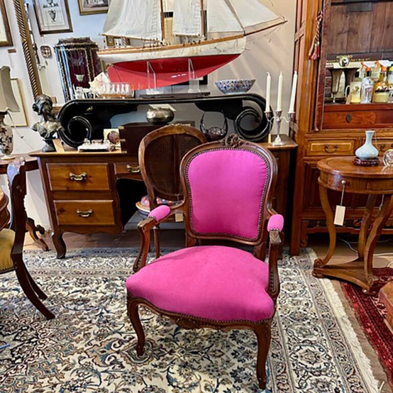 Hot pink upholstered antique mahogany chair at Coastal Classics Furniture, Murwillumbah