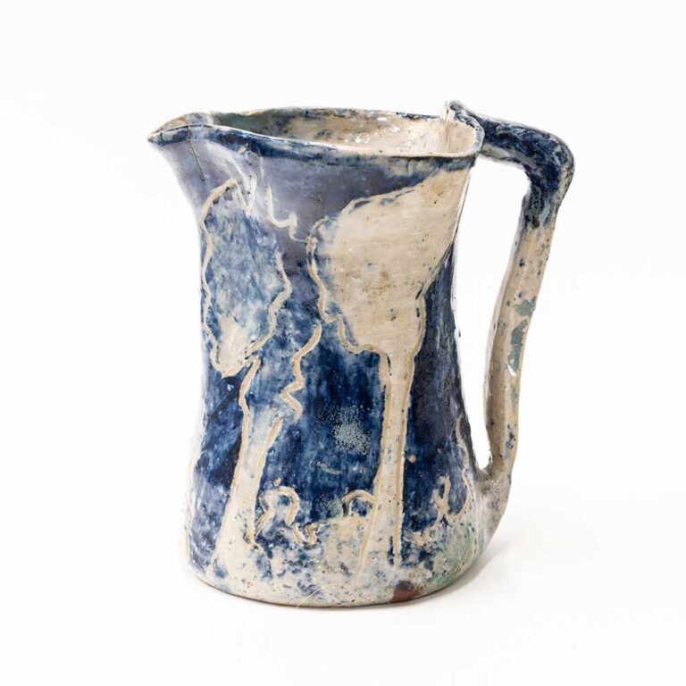 Merric Boyd, Jug with trees, 1942, ceramic, earthenware, wheel-thrown, incised, under-glaze, clear glaze. Bundanon Collection. Photo: June Andersen.