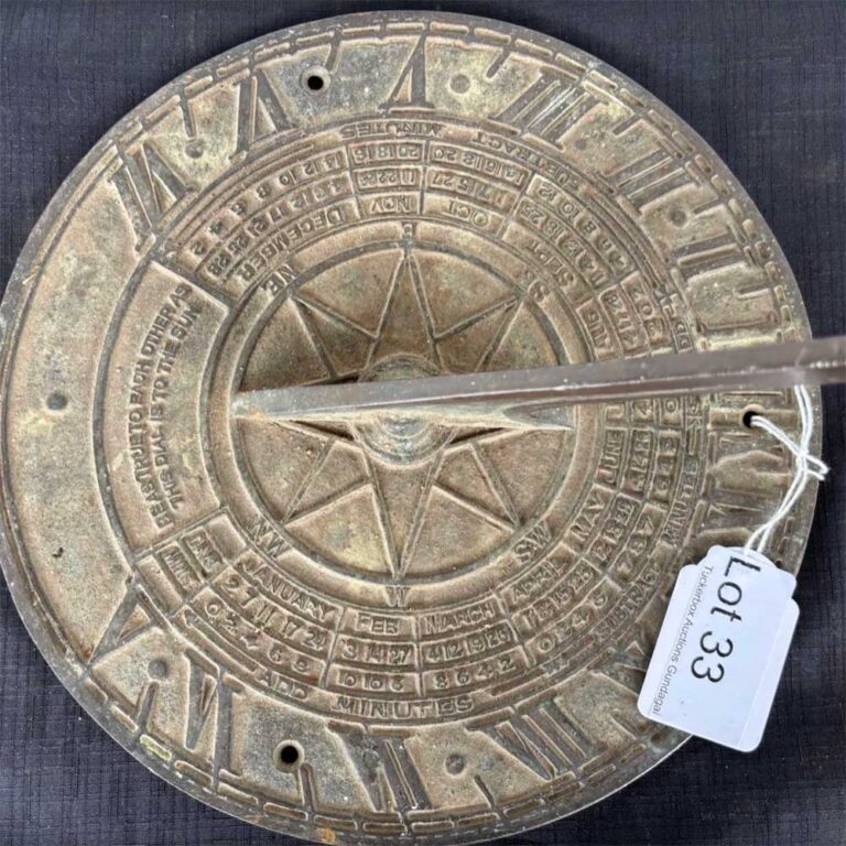Antique sun dial at Tuckerbox Auction