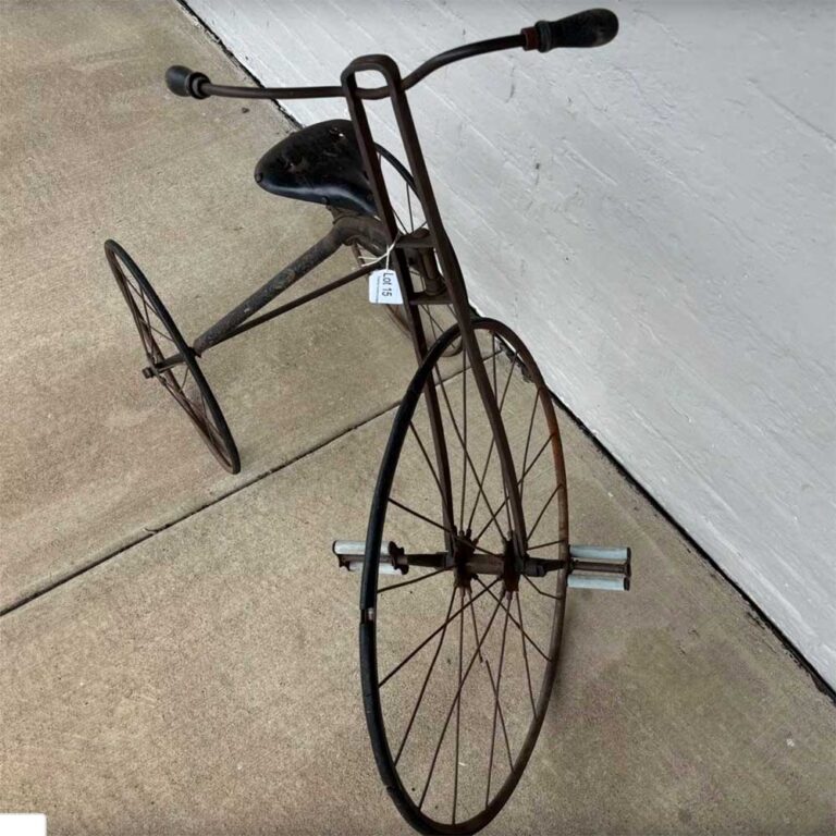 Antique tricycle at Tuckerbox Auction