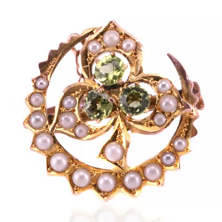Early Australian brooch with peridots and pearls by Australian jeweller S. Schlank