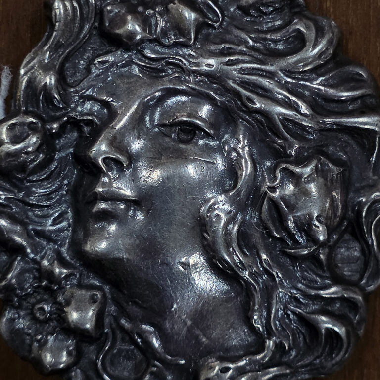 original vintage Art Nouveau sterling silver brooch of a maiden