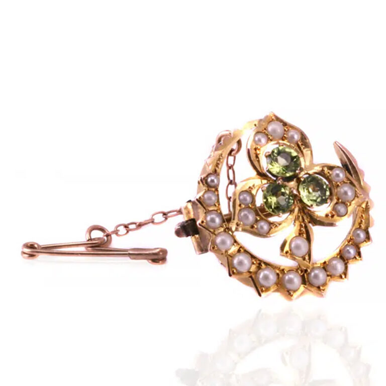 Early Australian brooch with peridots and pearls by Australian jeweller S. Schlank