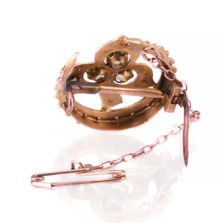 Early Australian brooch with peridots and pearls by Australian jeweller S. Schlank