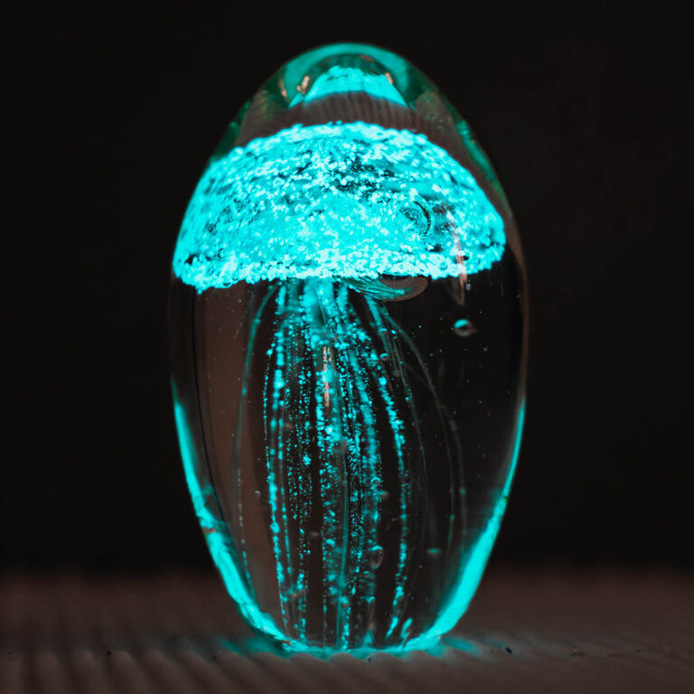 Fluorescent glass paperweight in the form of a jellyfish