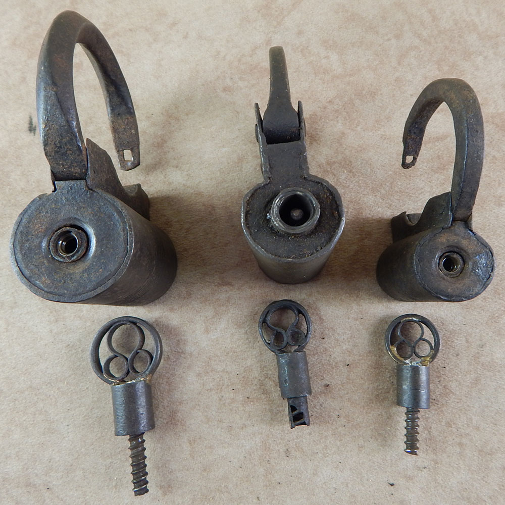 Antique screw-key iron padlocks