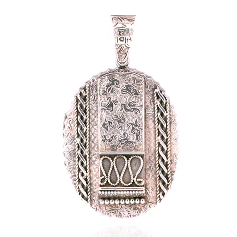 Antique hand engraved silver locket