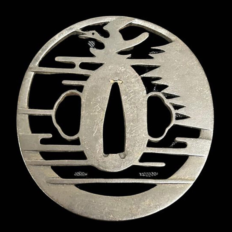 An antique samurai sword Japanese sukashi tsuba with a motif of a cuckoo and the moon.
