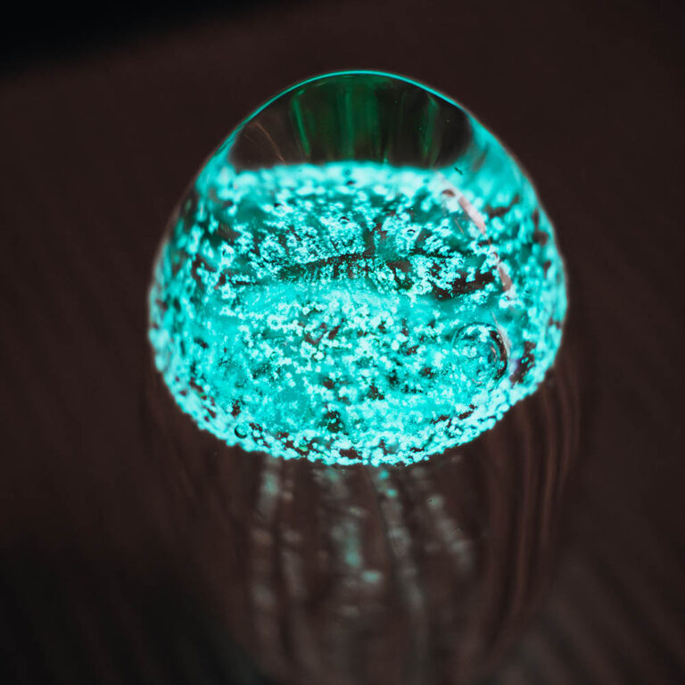 Fluorescent glass paperweight in the form of a jellyfish