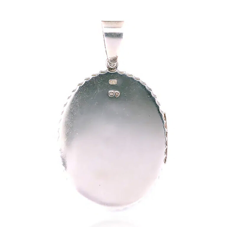 Antique hand engraved silver locket