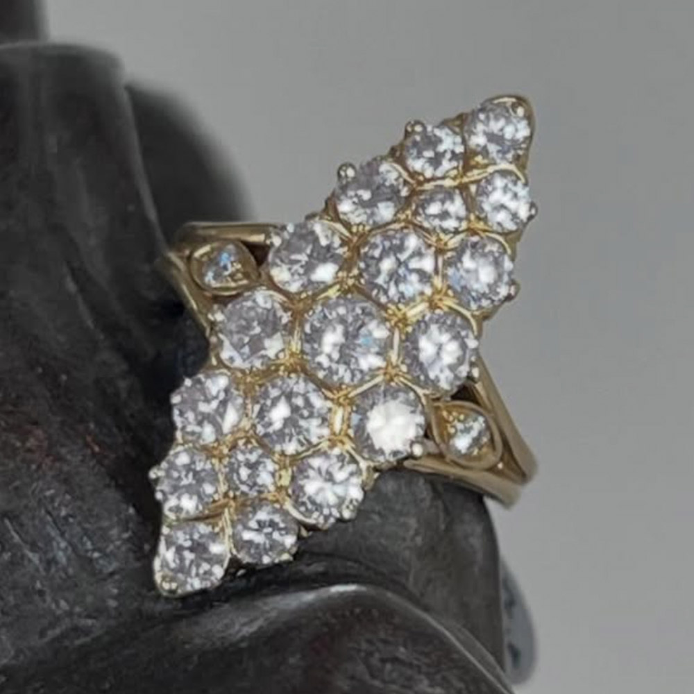 Marquise shape gold and diamond ring