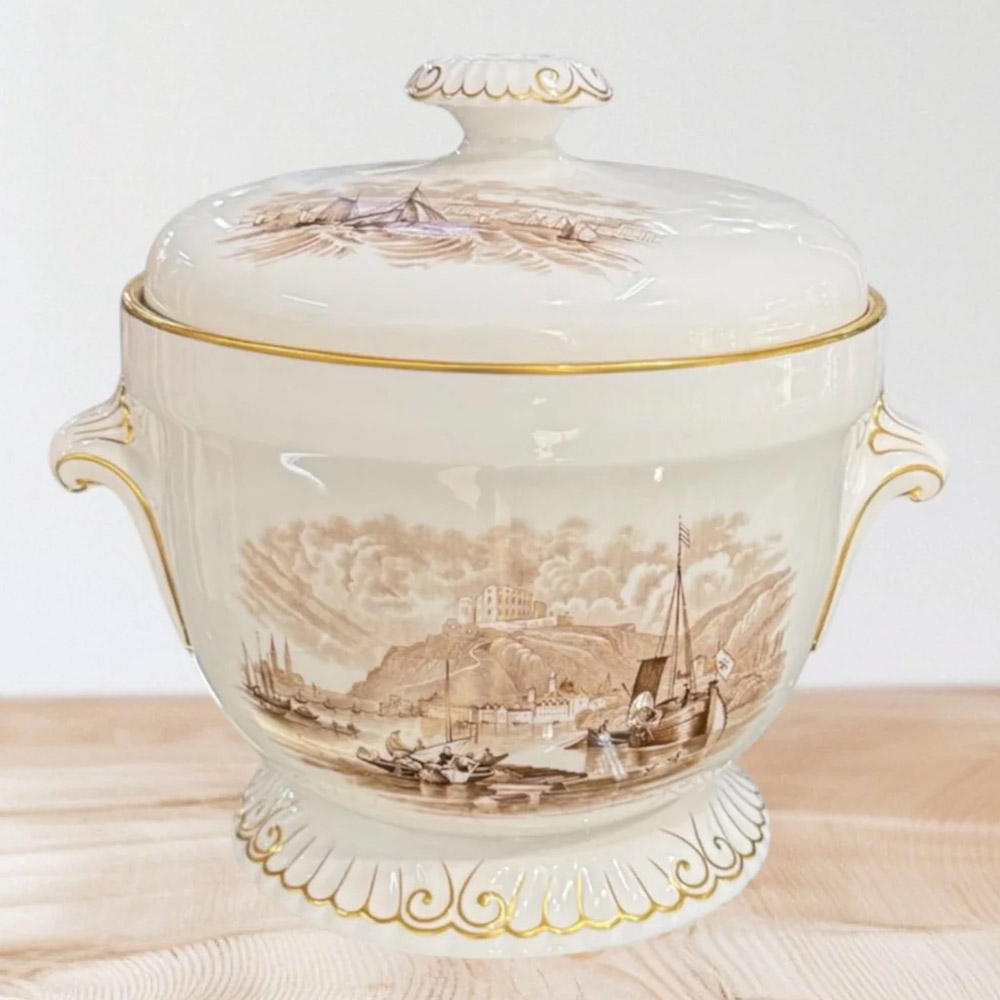 Spode porcelain ice pail with a plastic ice basket and insulated inner