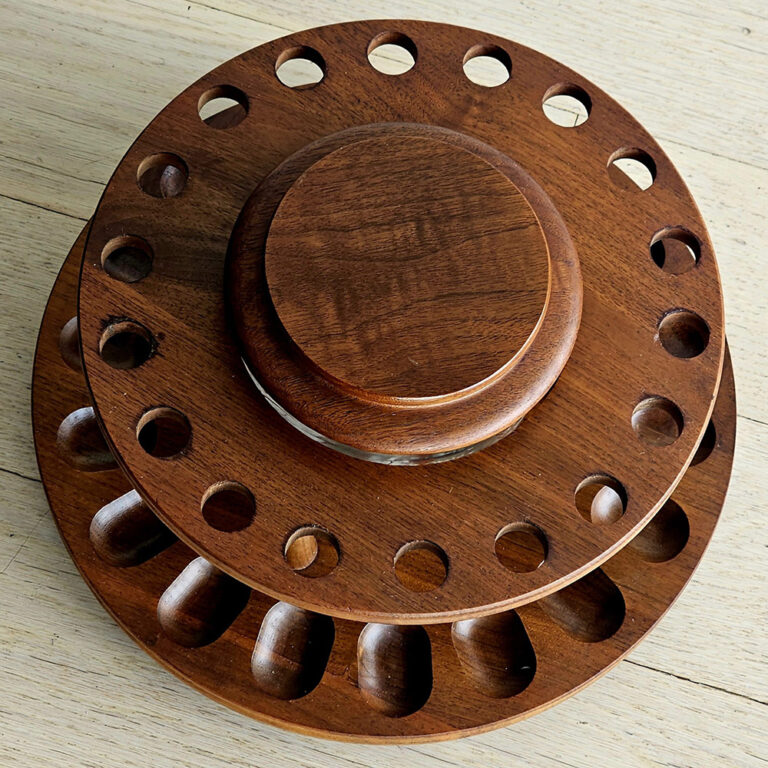 Vintage timber pipe stand in the lazy Susan style.