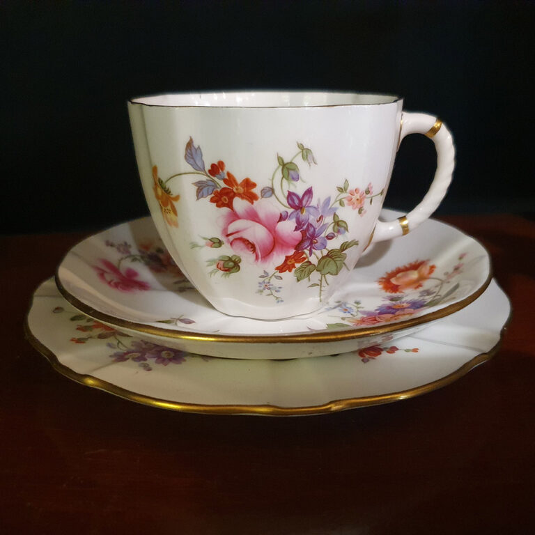 A Royal Crown Derby trio in the Posies pattern